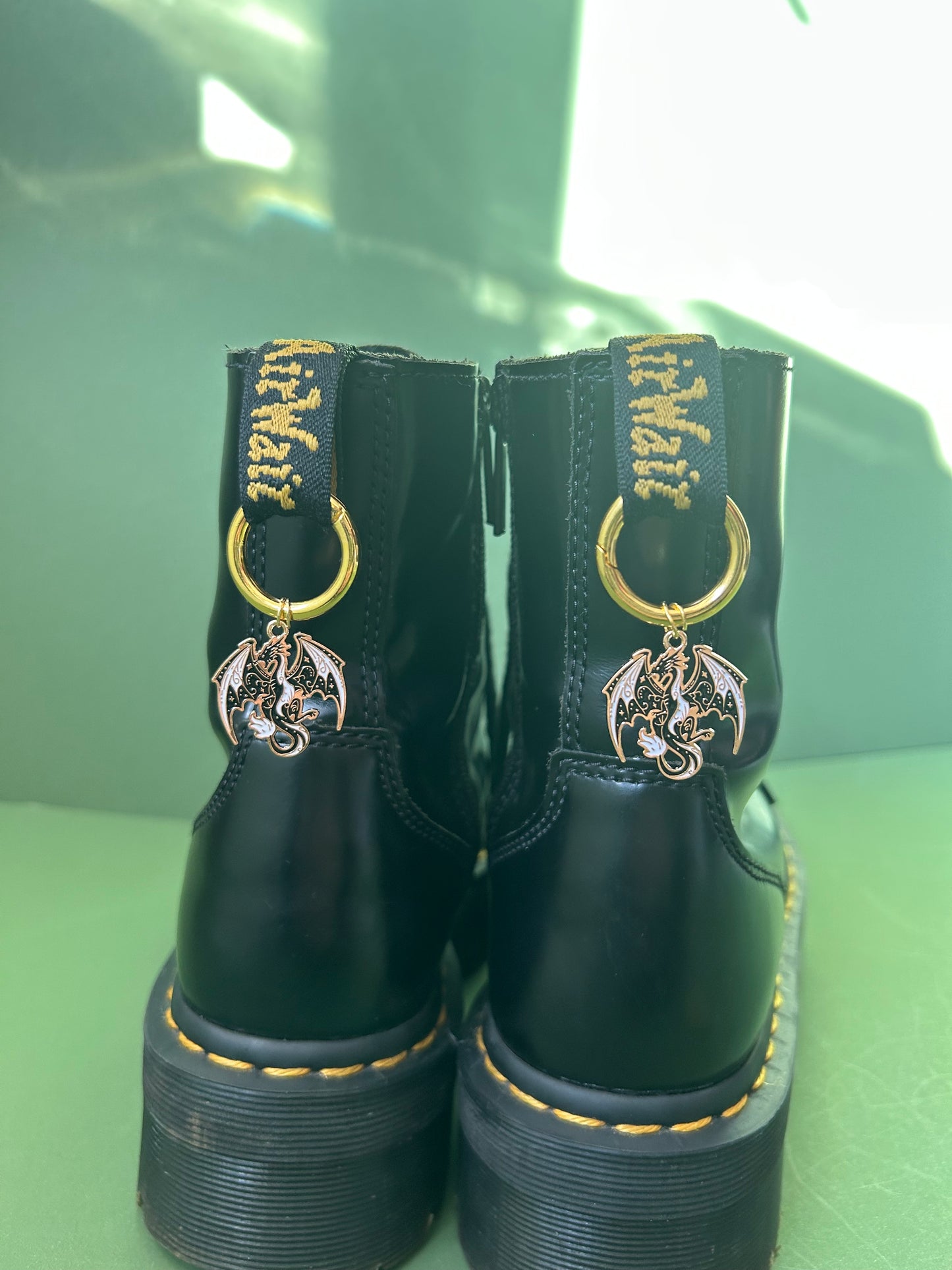 gold and black dragon boot charms