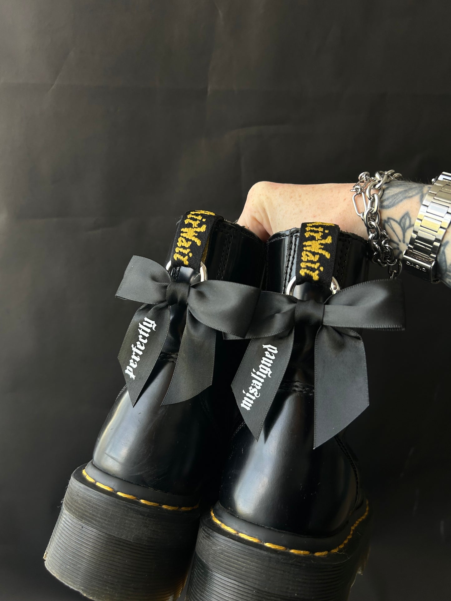 Misaligned Bow boot charms