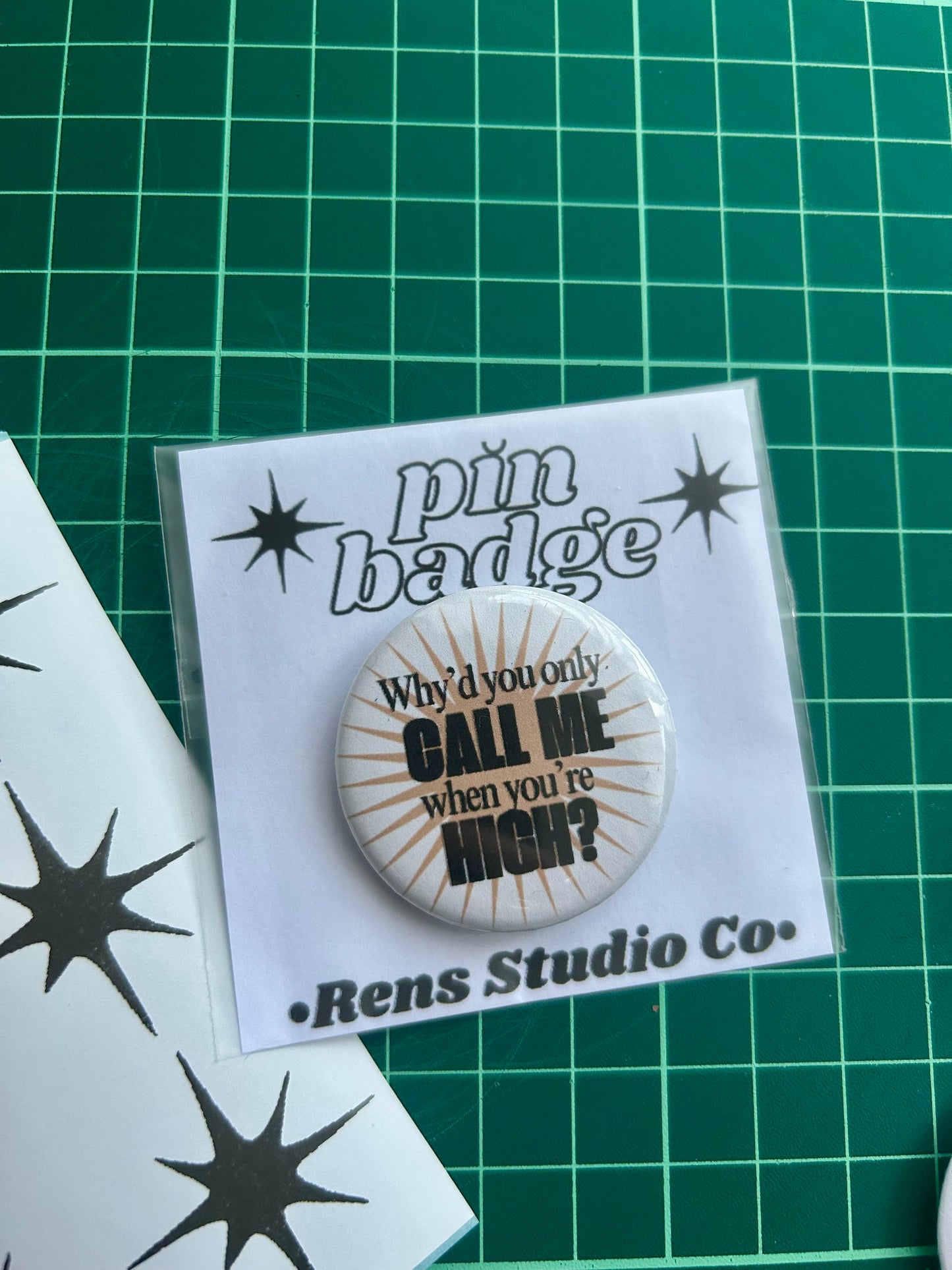 high pin badge