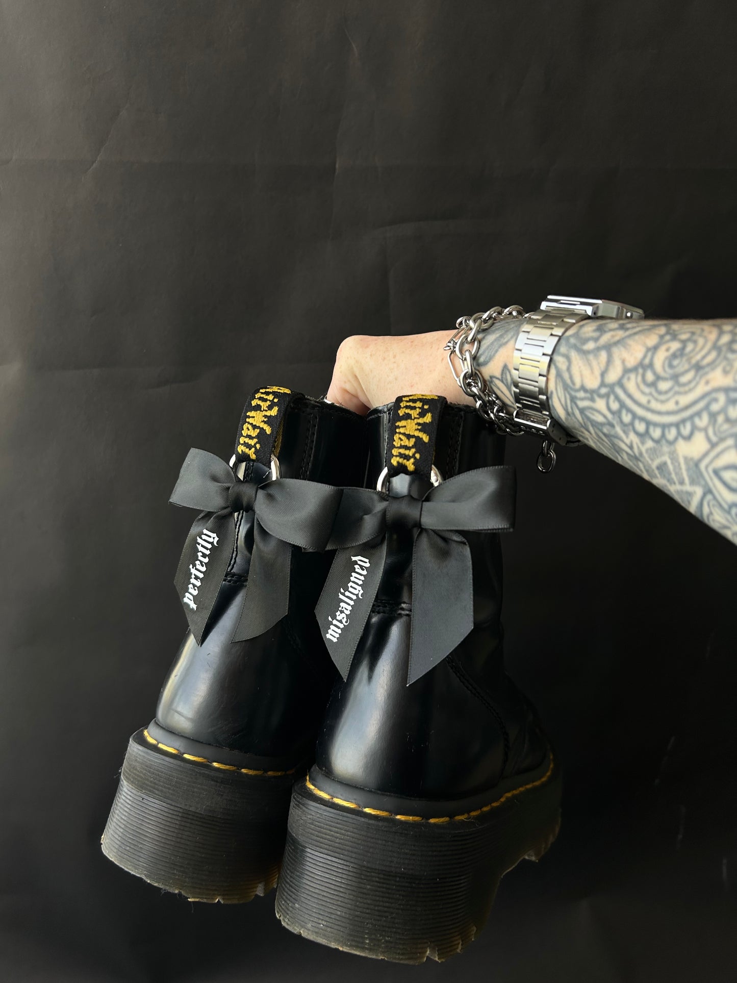 Misaligned Bow boot charms