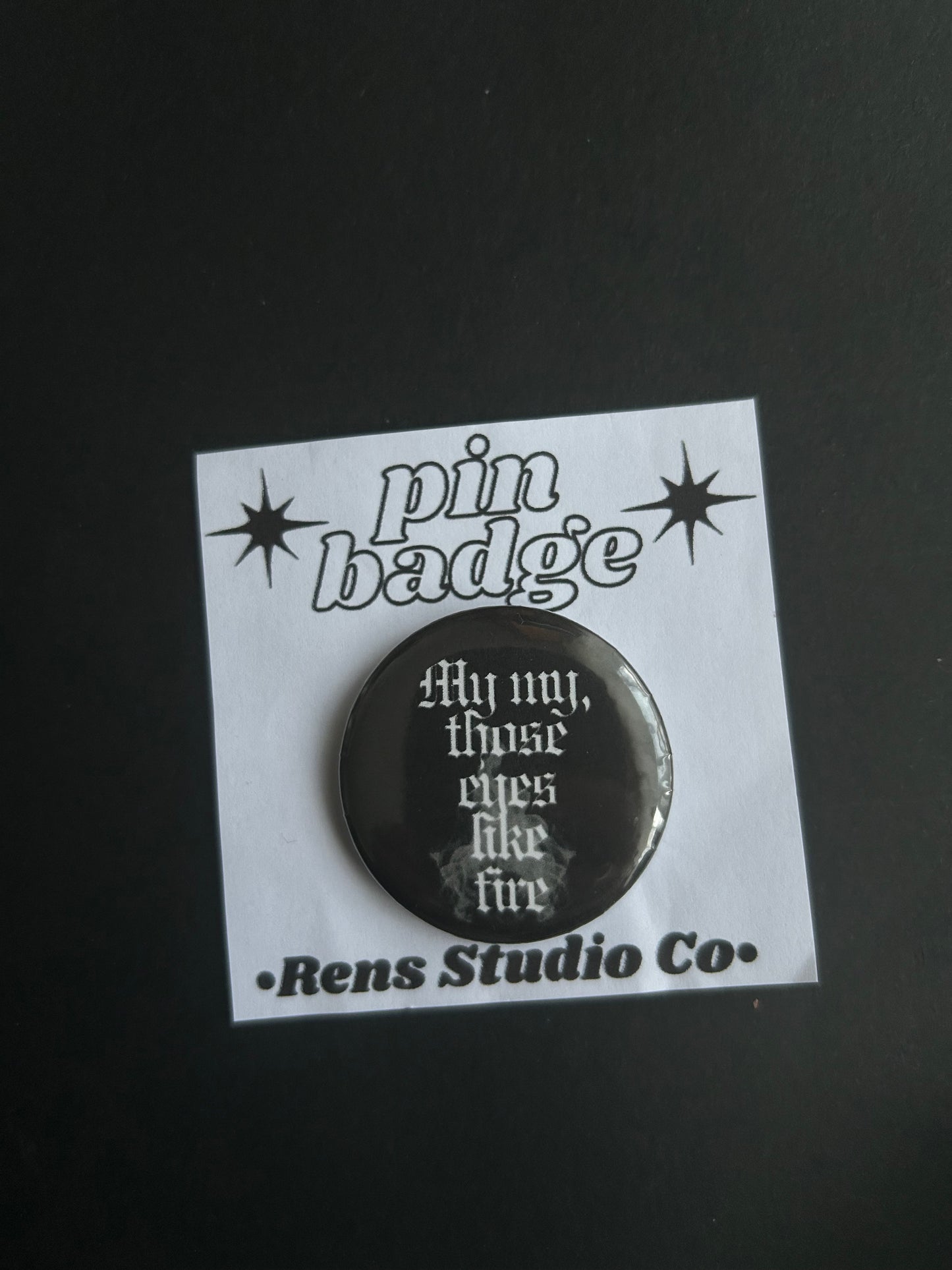 eyes like fire pin badge