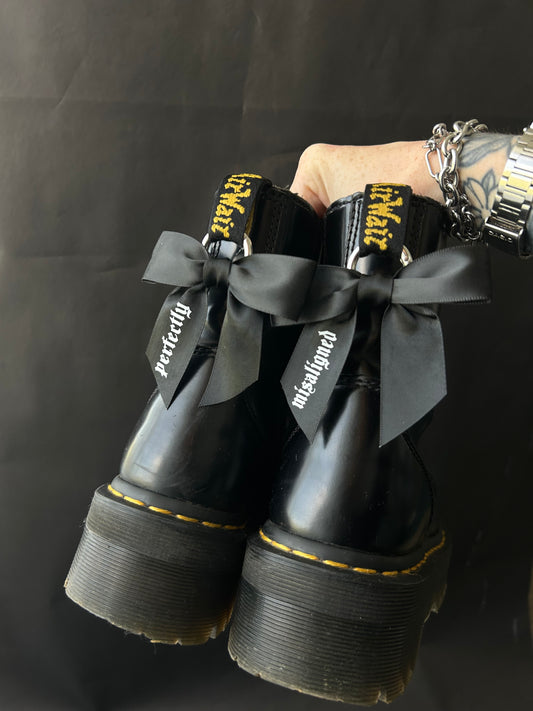 Misaligned Bow boot charms