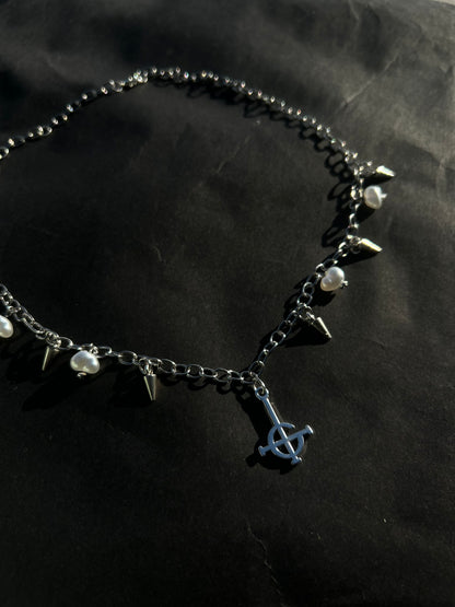 spiked pearl crucifix necklace
