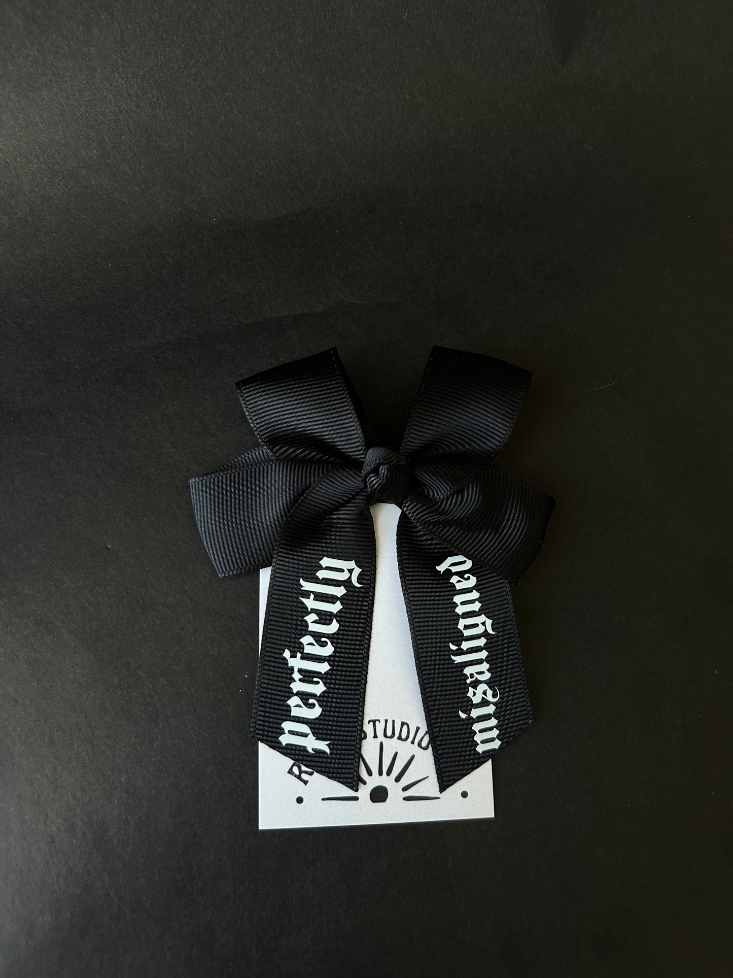 Mini misaligned hair bow