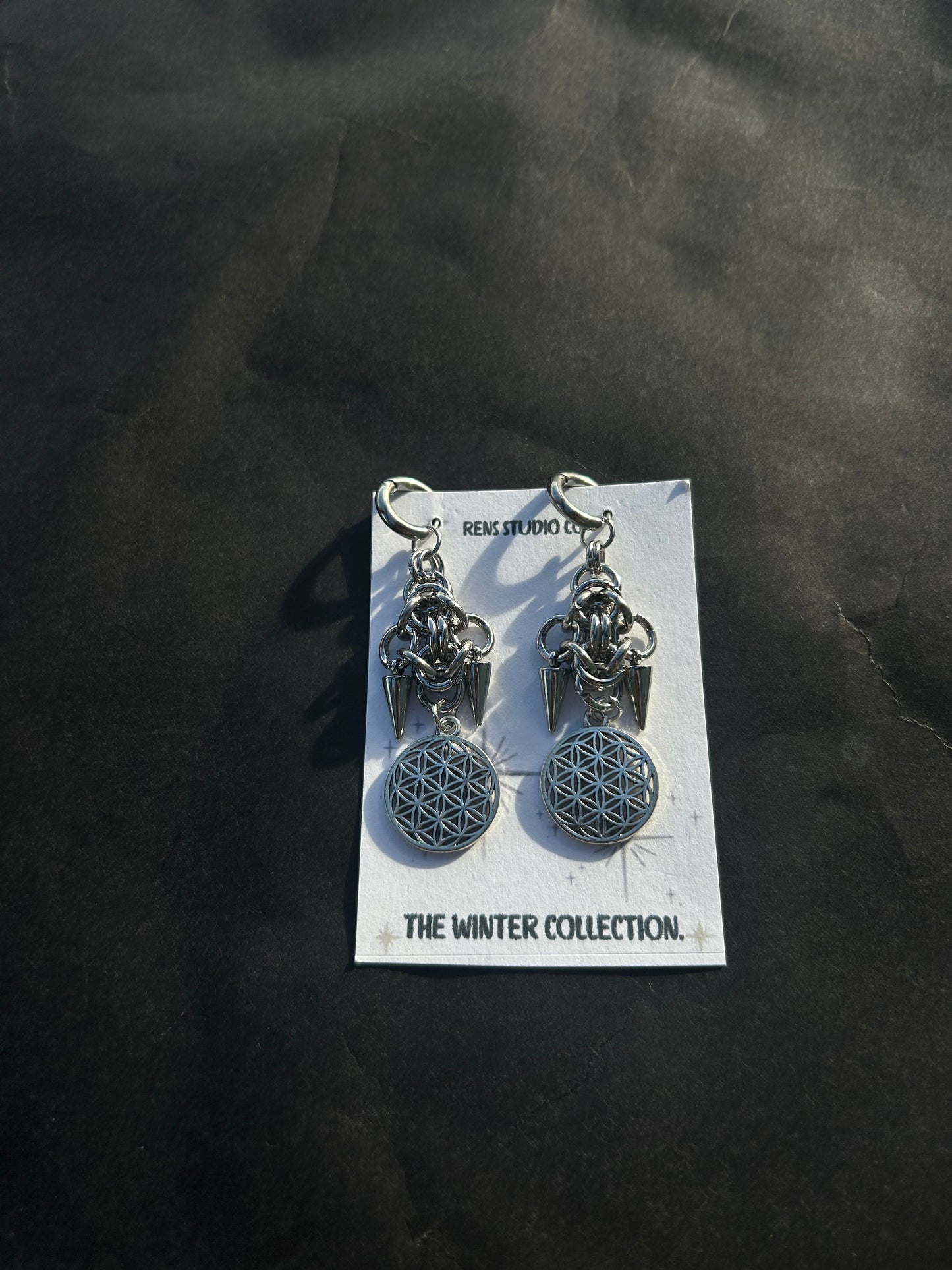 Flower of life chain mail earrings.