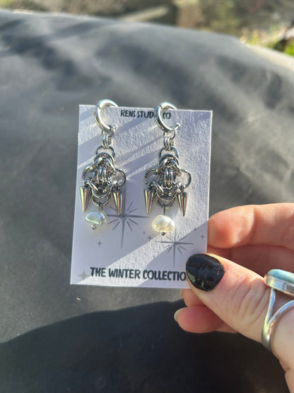 pearl chain mail earrings.