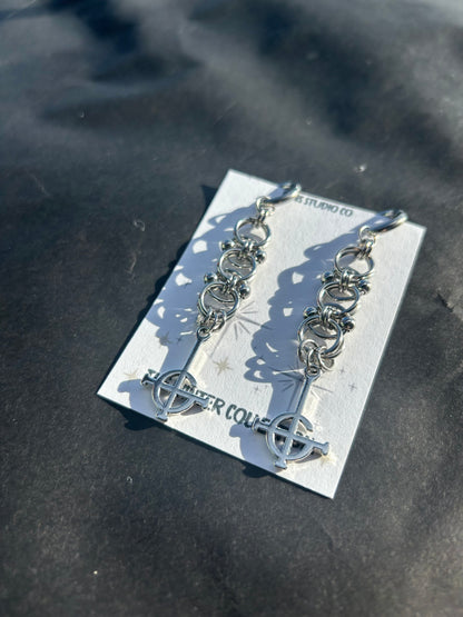 crucifix bull ring earrings