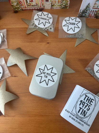 1975 Tin - Build your own charm necklace.