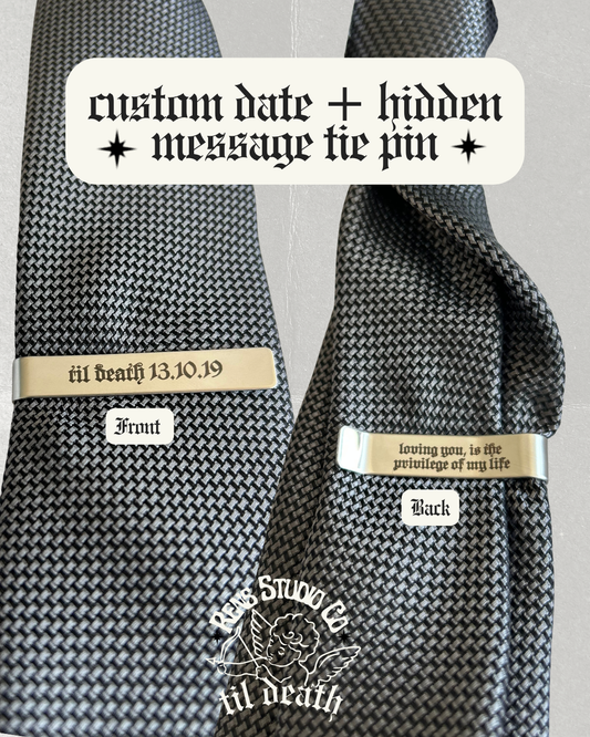 Hidden message tie pin.
