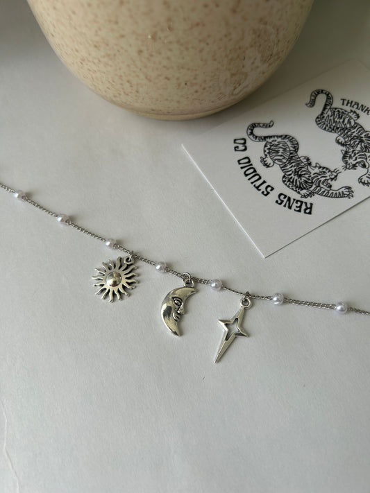 Sun moon and star pearl necklace