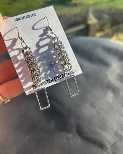 boxed chain mail hook earrings.