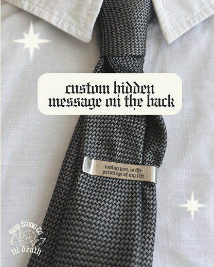 Hidden message tie pin.