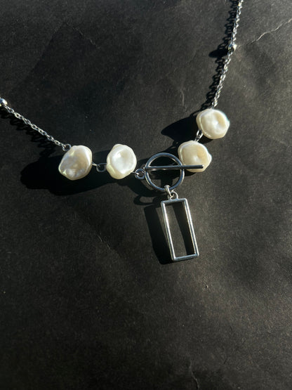 The box band necklace.