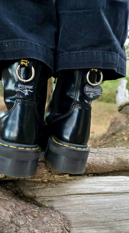 Unusually strange dr marten charms.