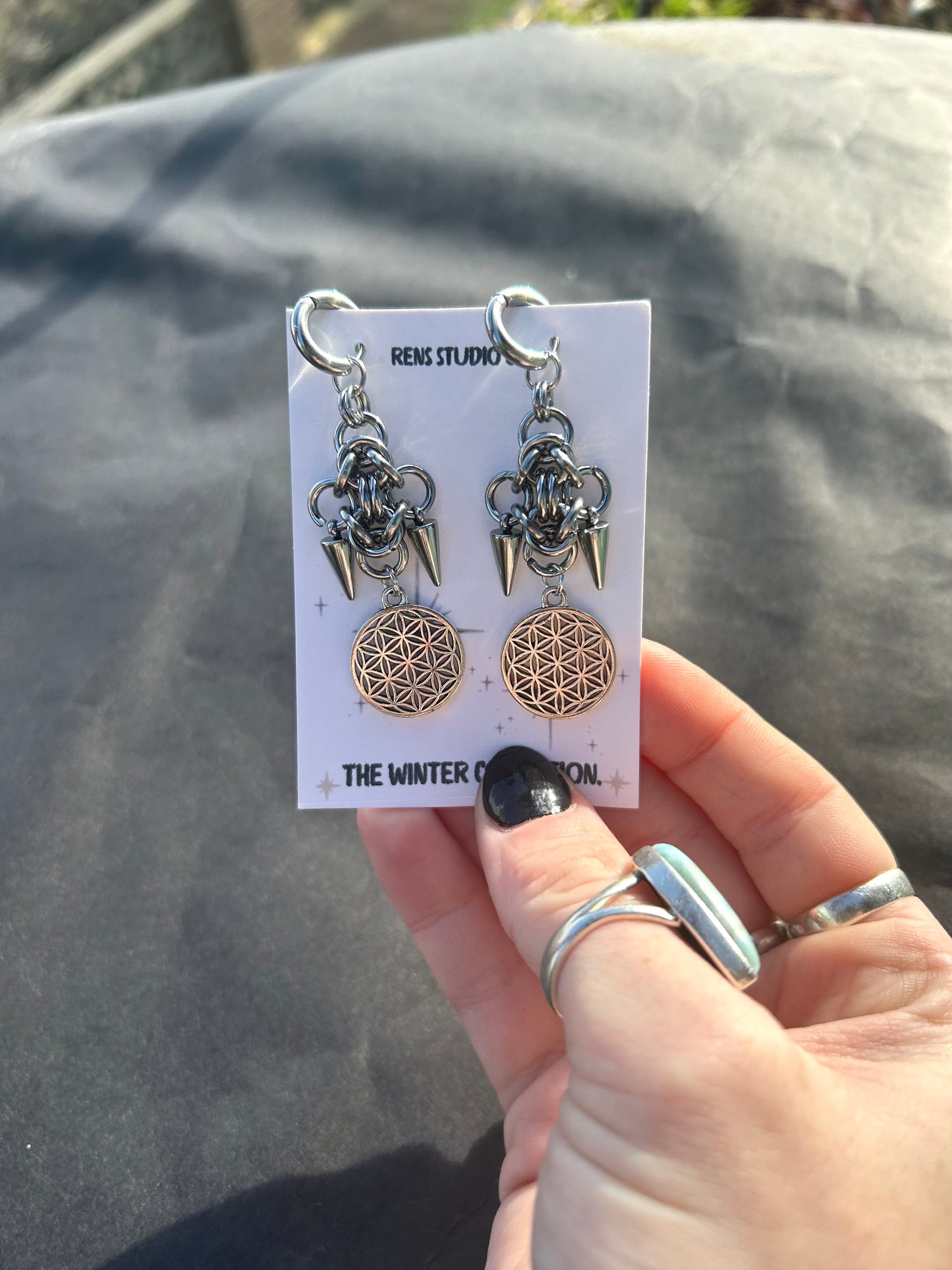 Flower of life chain mail earrings.
