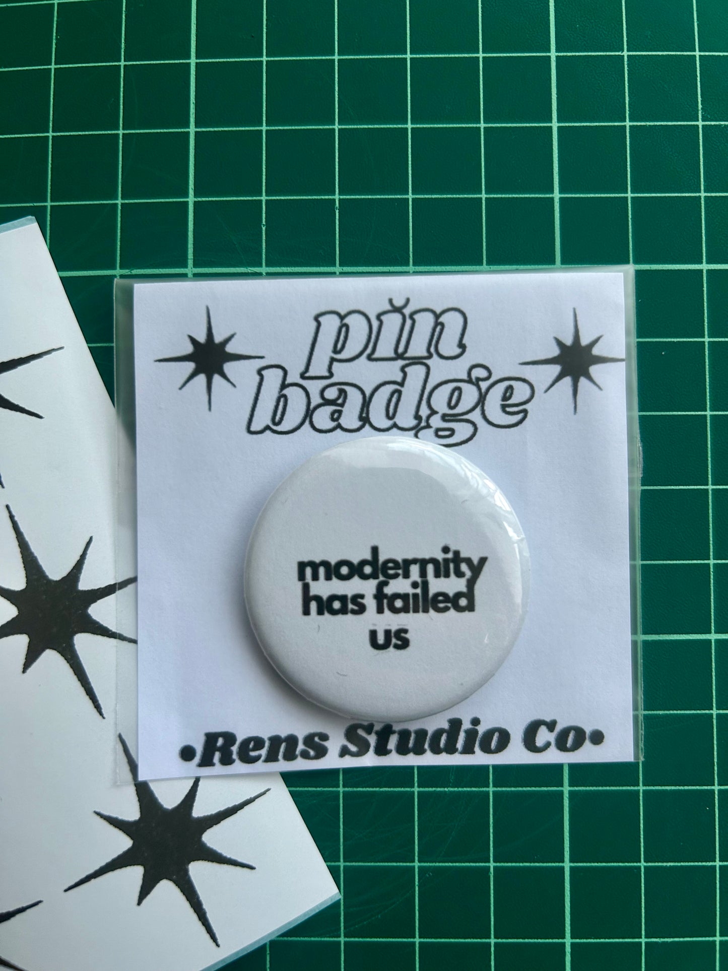 modernity pin badge