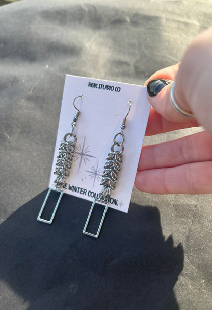 boxed chain mail hook earrings.