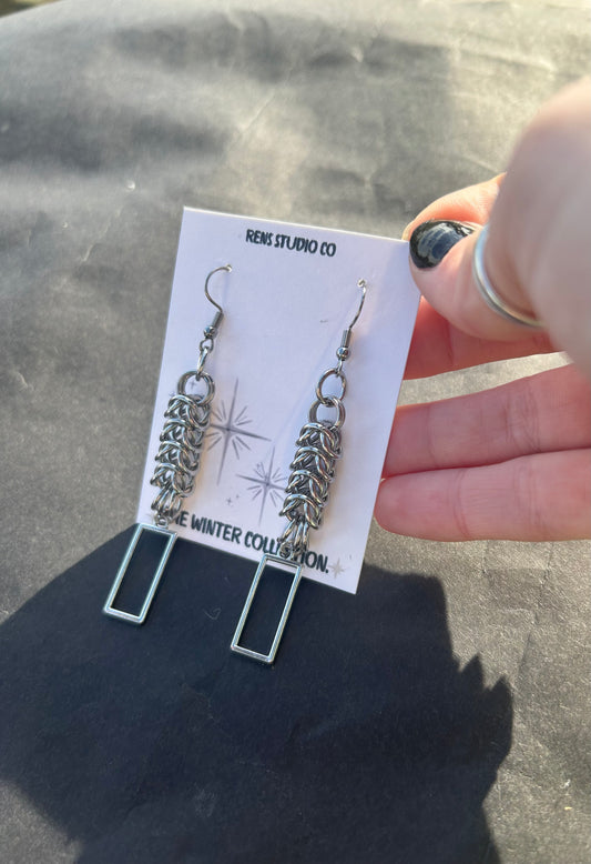 boxed chain mail hook earrings.
