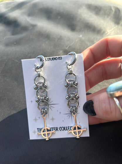 crucifix bull ring earrings