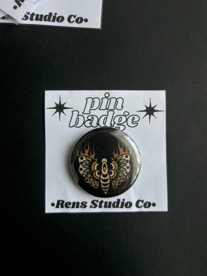 moth pin badge
