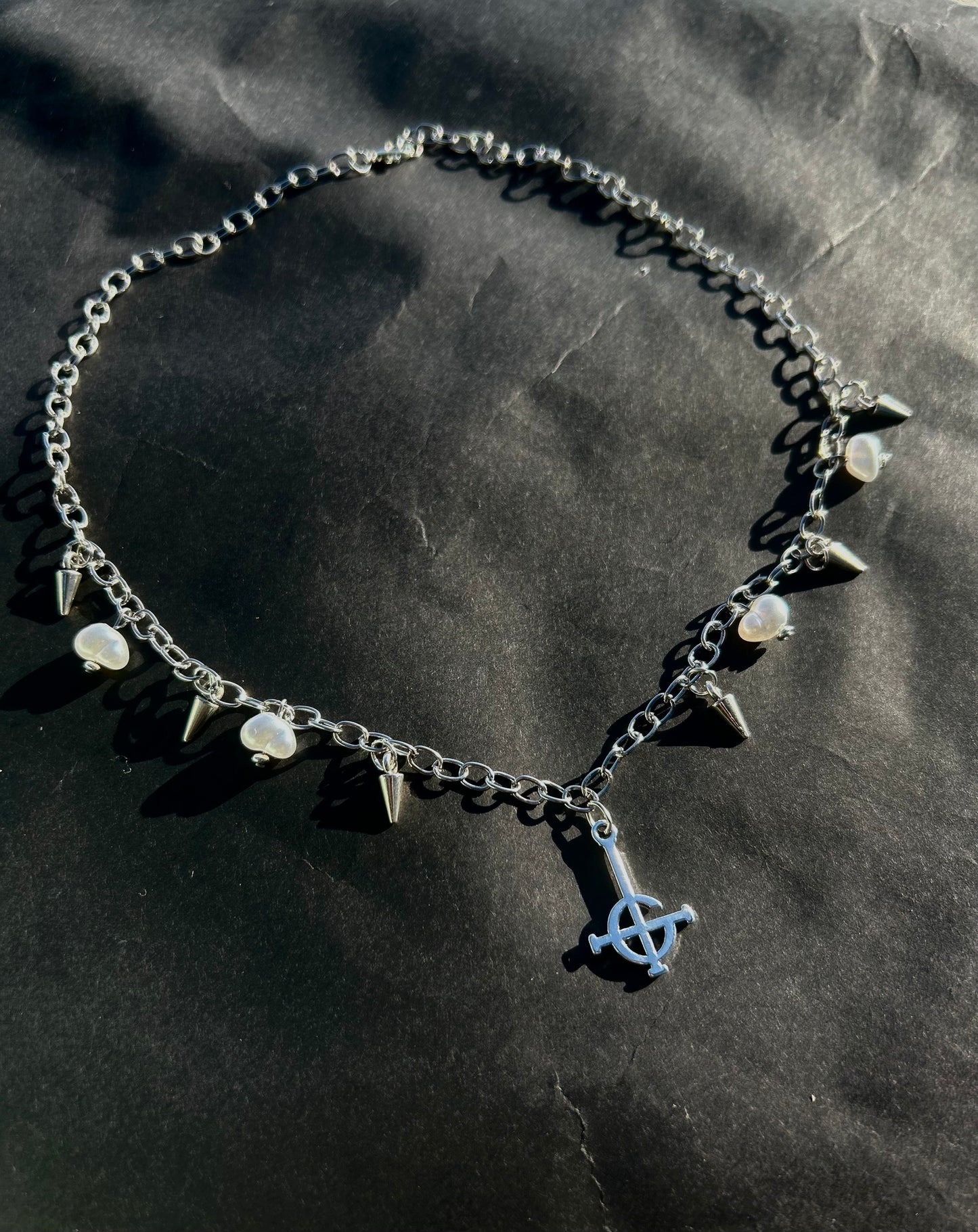 spiked pearl crucifix necklace