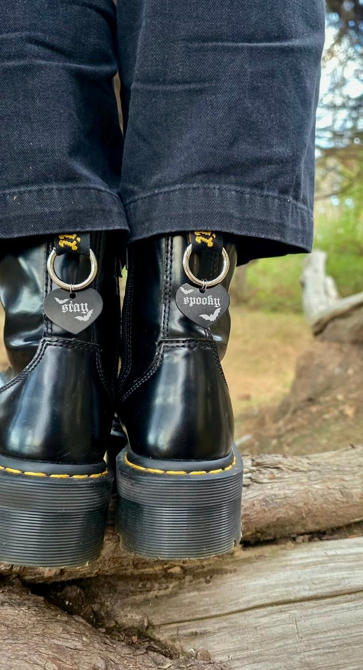Stay spooky dr marten charms.