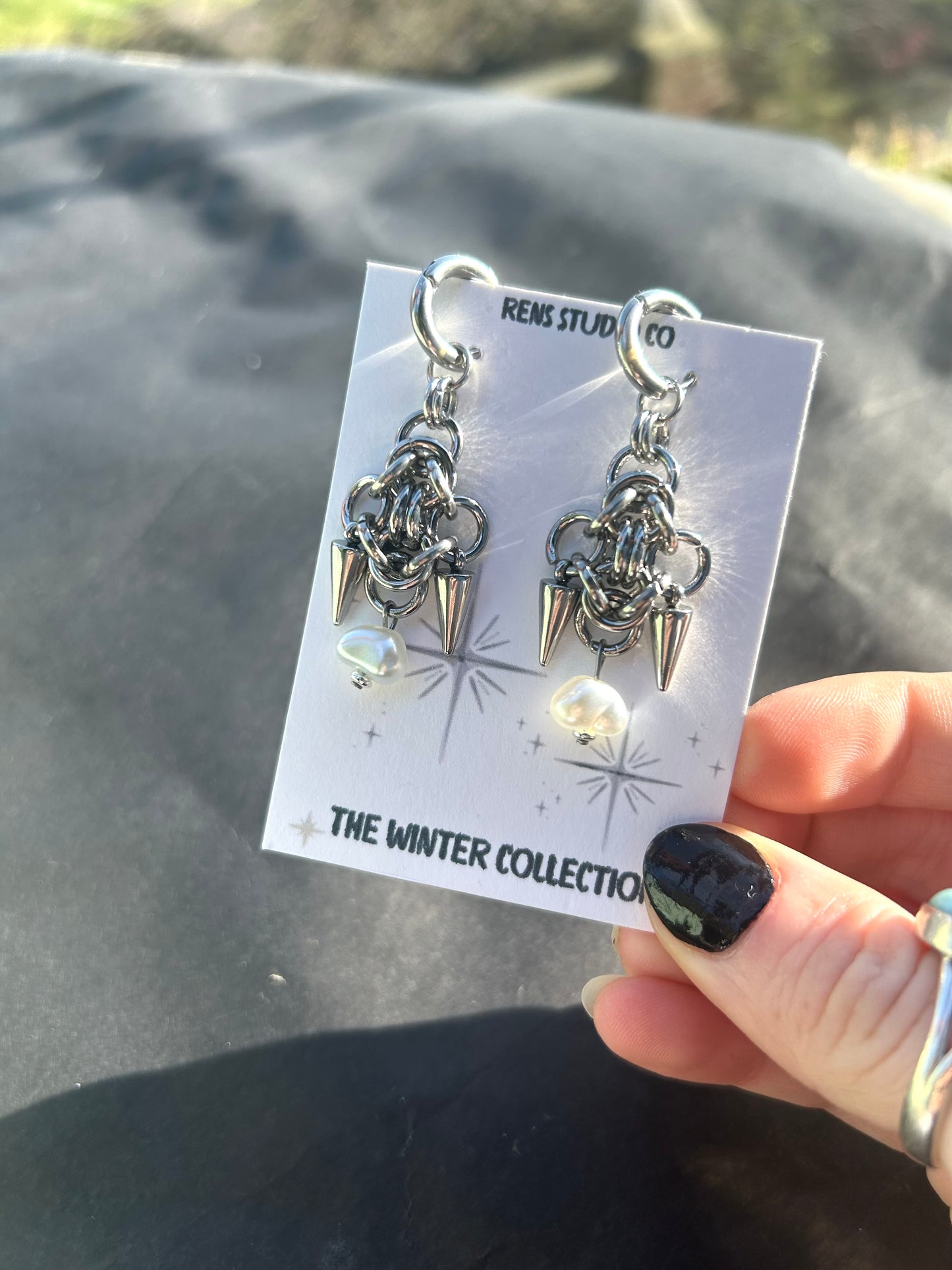 pearl chain mail earrings.