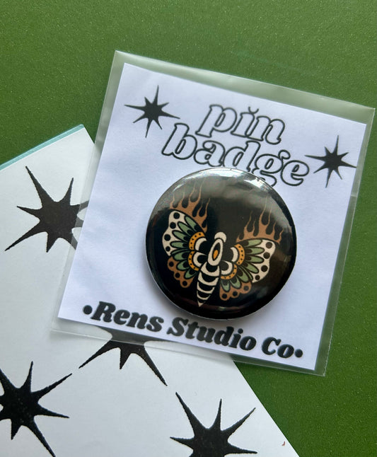 moth pin badge