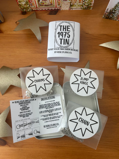 1975 Tin - Build your own charm necklace.