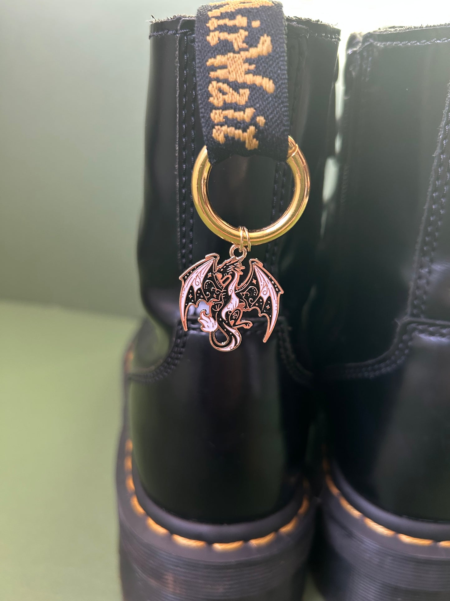 gold and black dragon boot charms