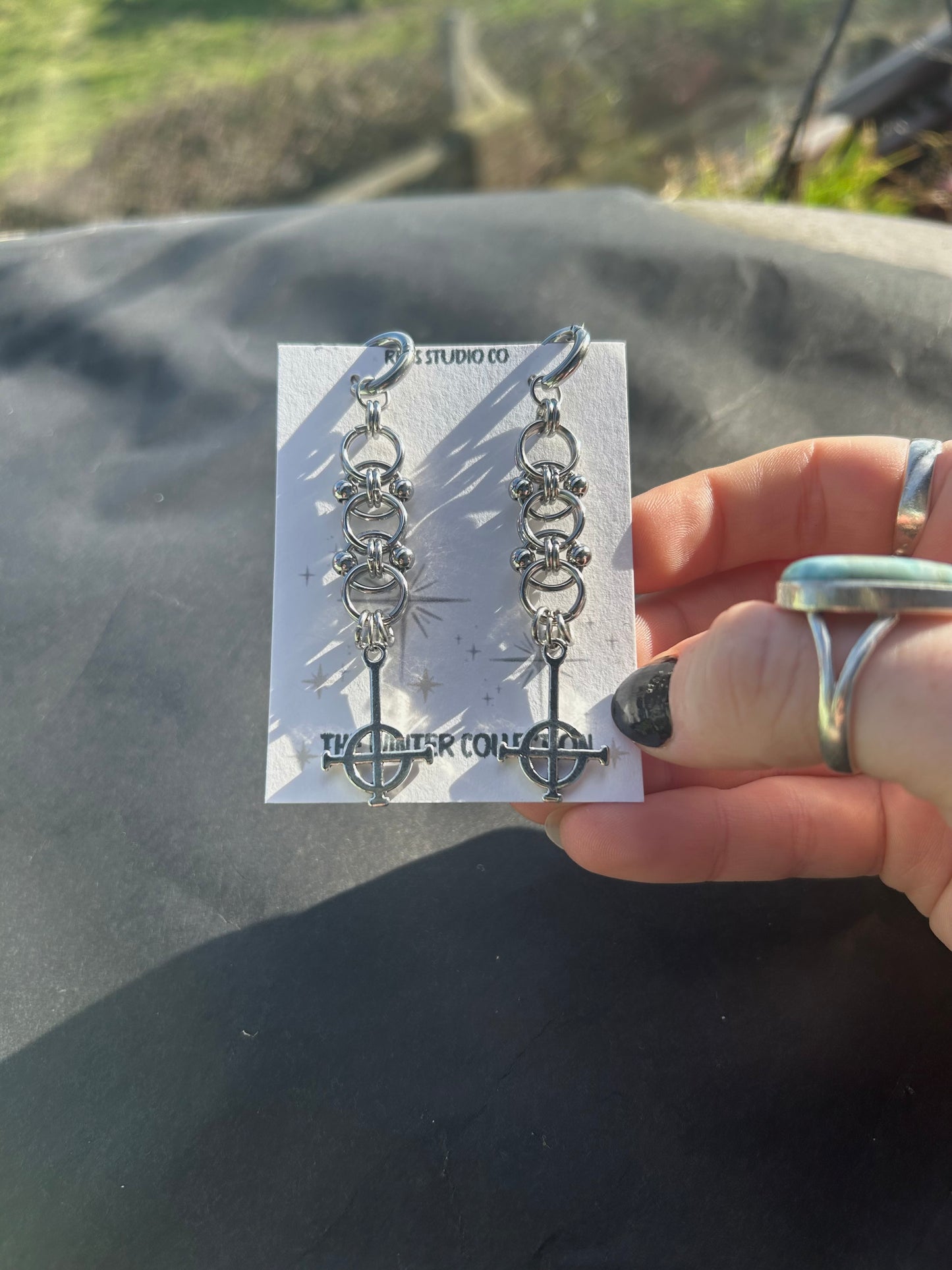 crucifix bull ring earrings