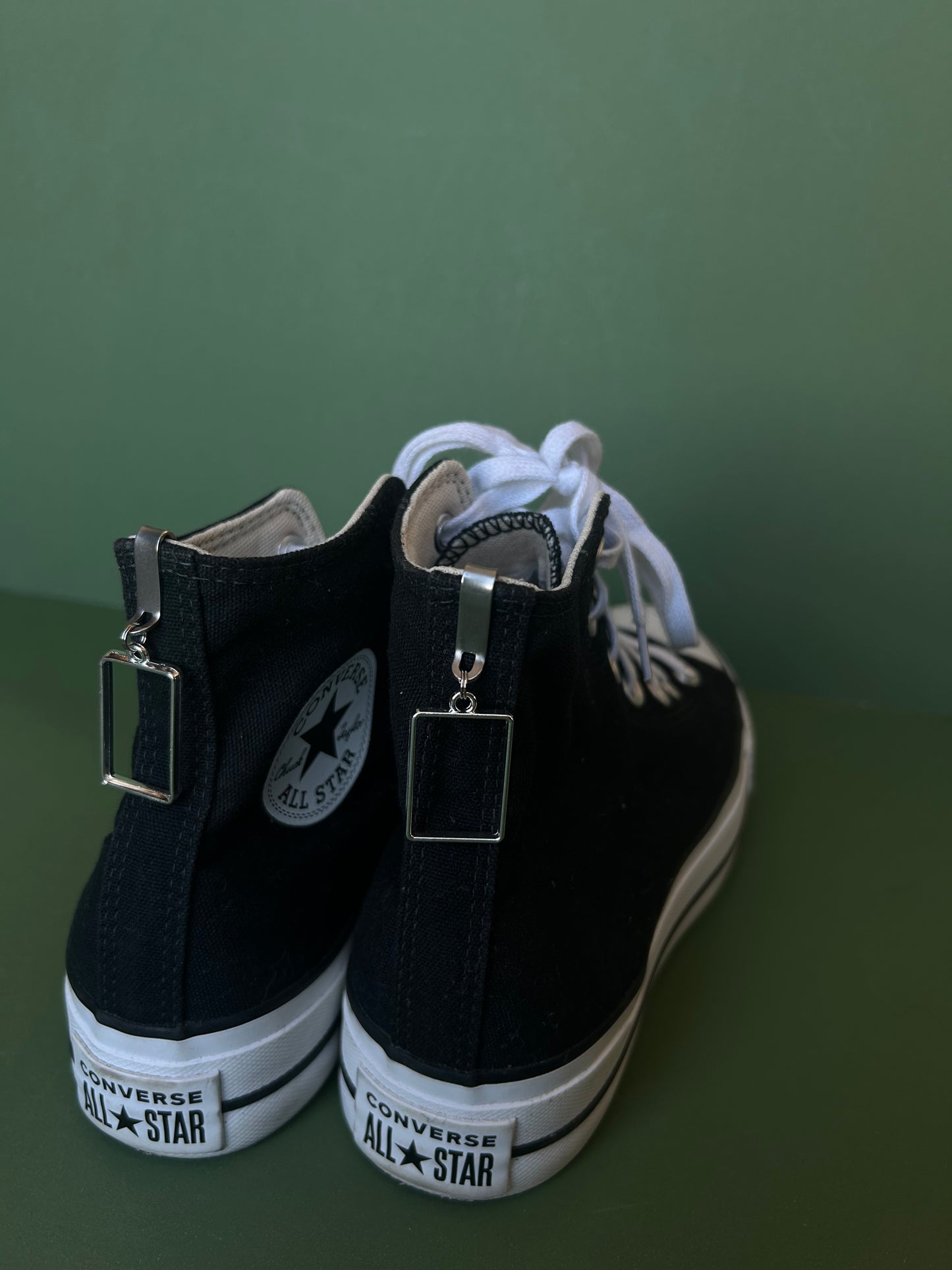 The 1975 box Hi top shoe charms