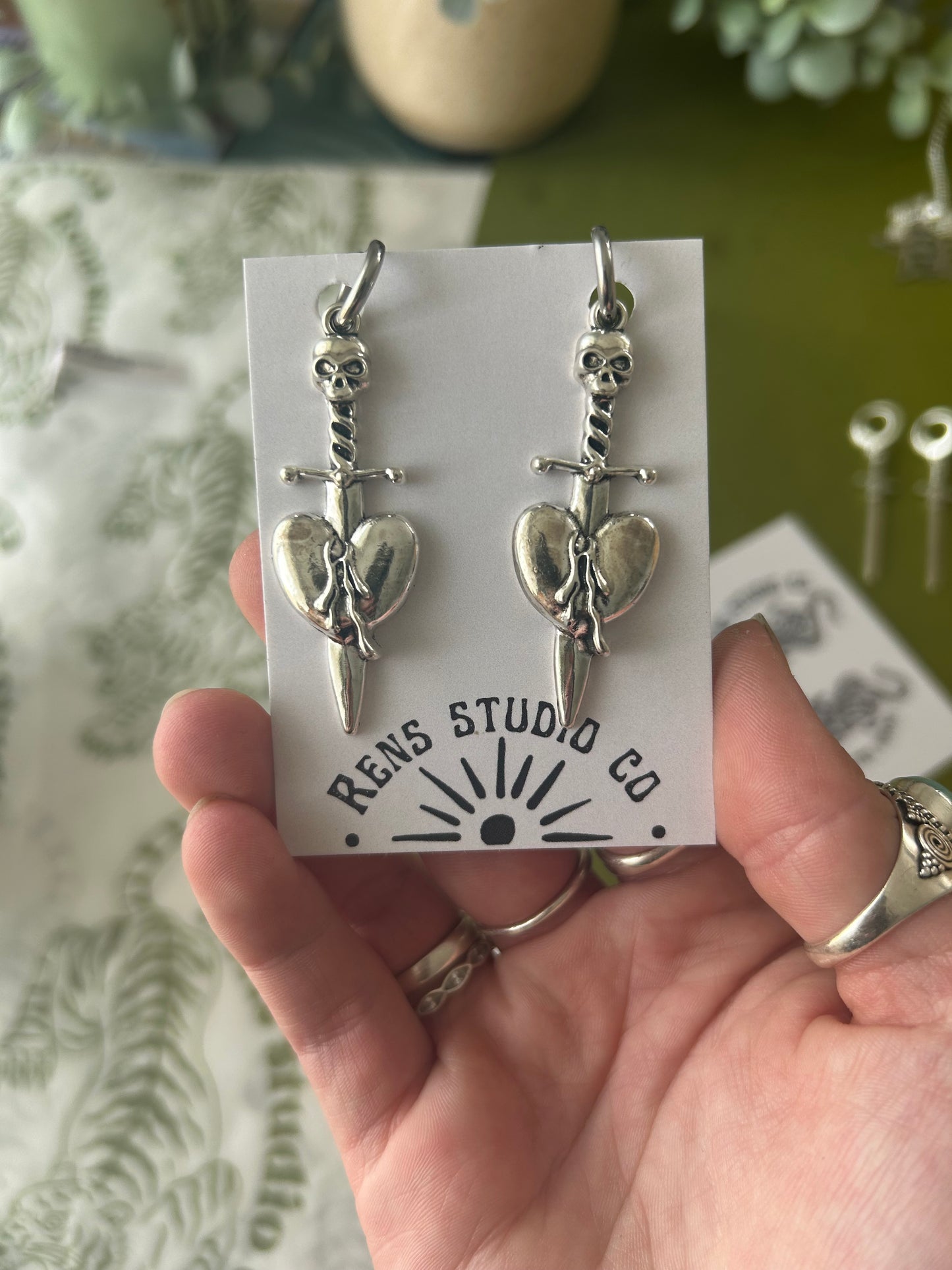 skull heart dagger earrings