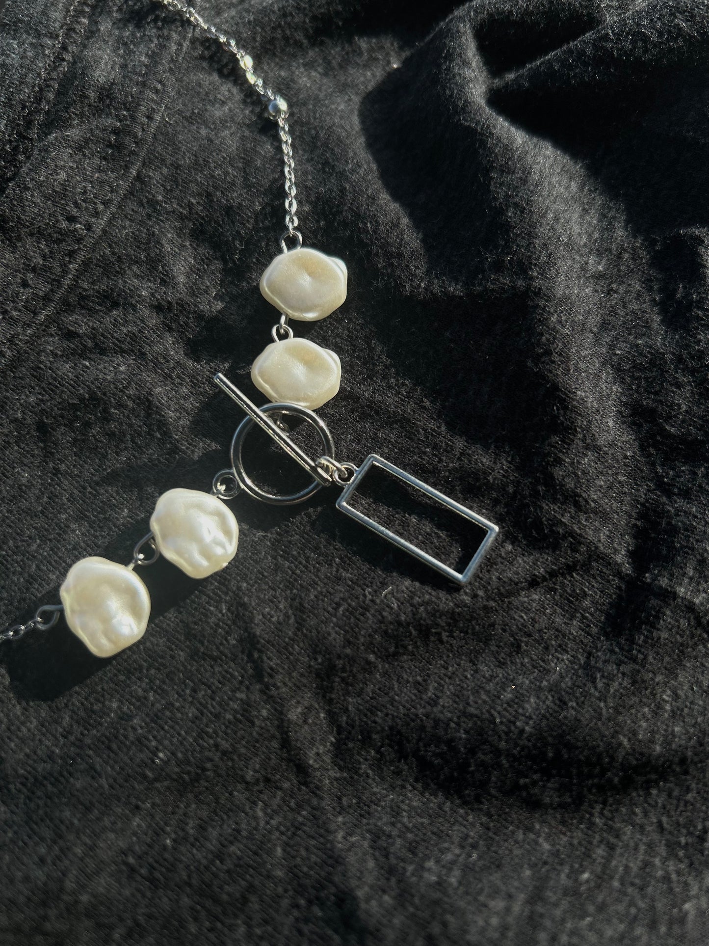The box band necklace.