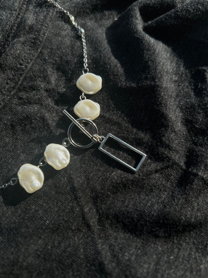 The box band necklace.