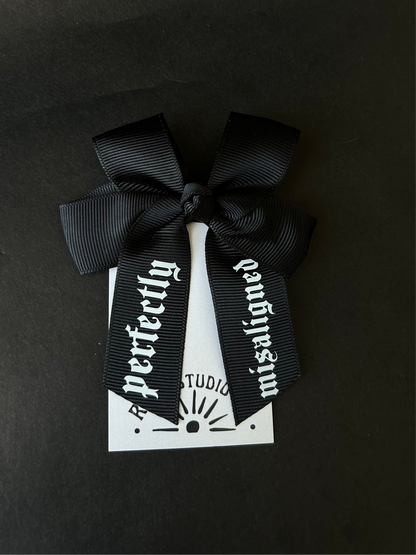 Mini misaligned hair bow