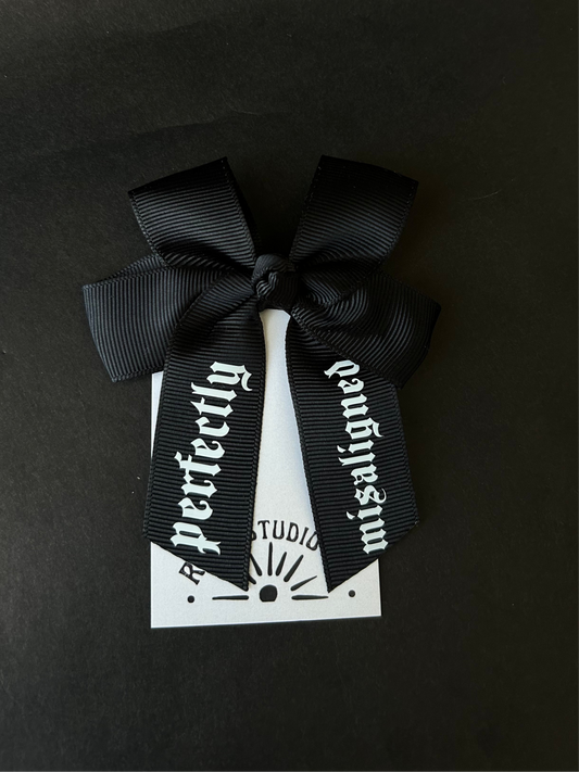 Mini misaligned hair bow