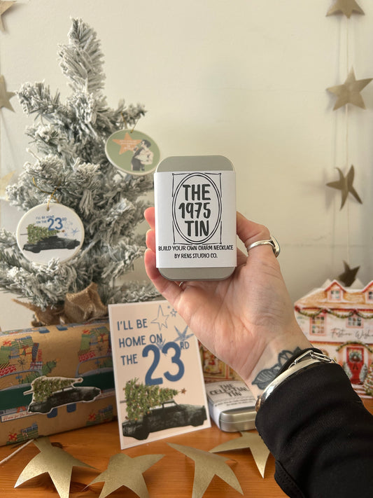 1975 Tin - Build your own charm necklace.