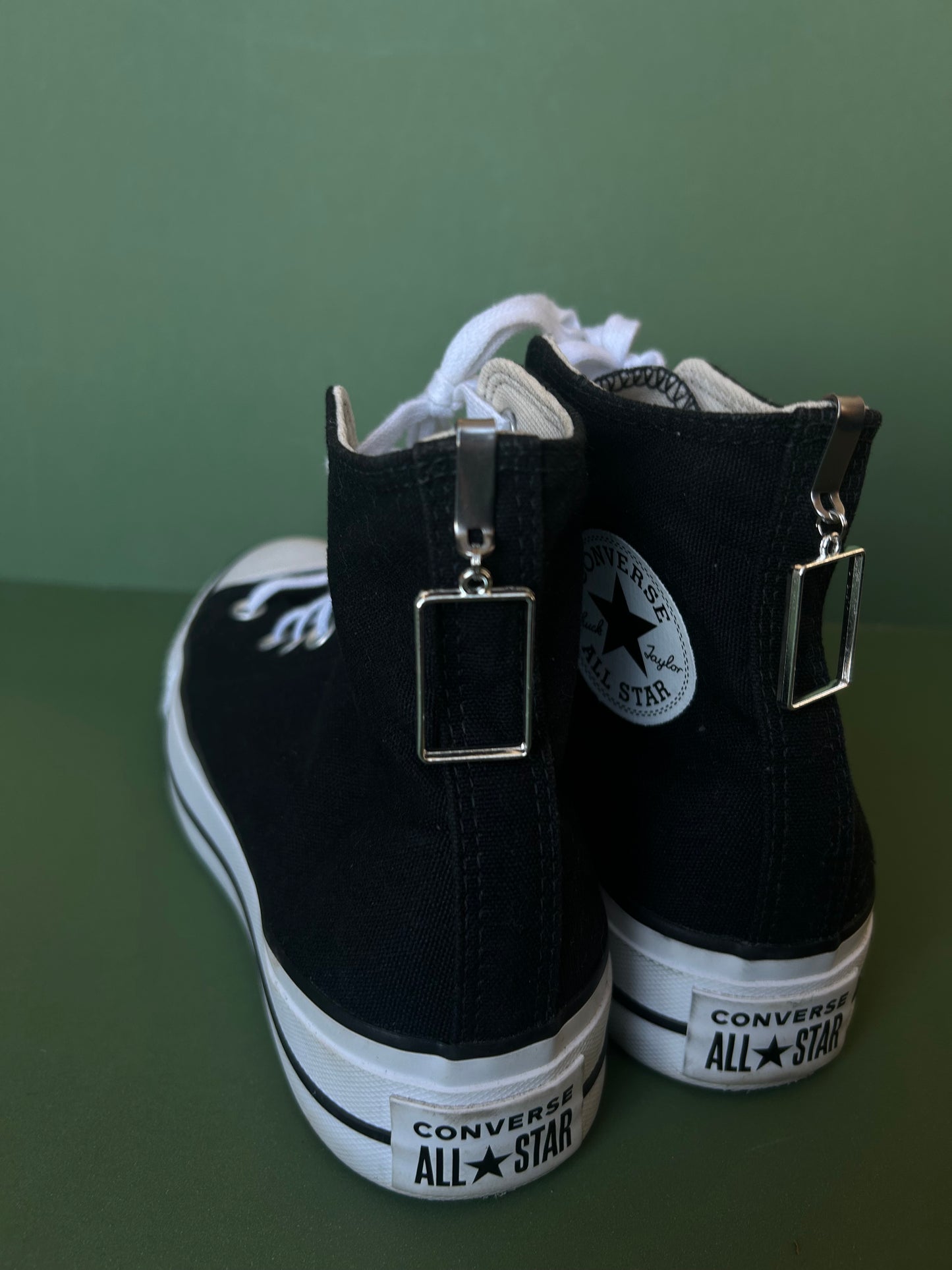 The 1975 box Hi top shoe charms