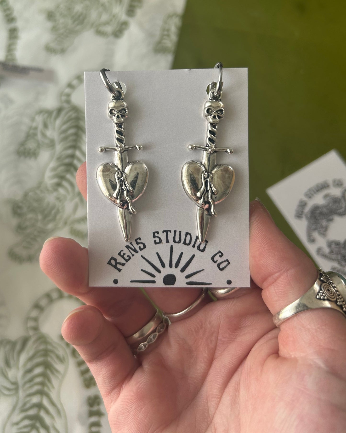 skull heart dagger earrings